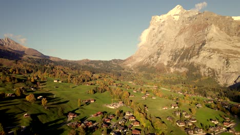 aerial-drone-footage-pushing-in-over-village-of-Grindelwald-at-sunset