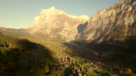 aerial-drone-footage-pushing-out-over-Grindelwald-village-with-picturesque-views-of-Mount-Wetterhorn