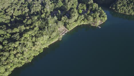Lake-Eacham-With-Lush-Rainforest-On-The-Atherton-Tableland-Of-Queensland-In-Australia---aerial-top-down