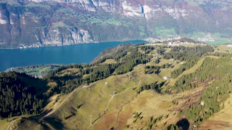 Establishing-shot-of-Walensee-Lake-with-a-ski-lift-operating-the-in-the-valley-below