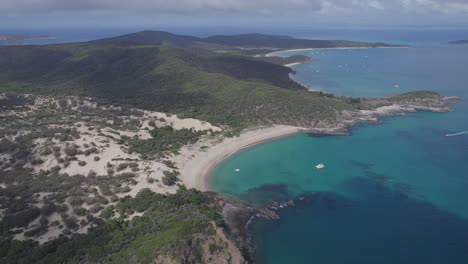 Panoramic-View-Over-Secret-Beach-With-Tranquil-Ocean-In-Great-Keppel-Island,-Queensland,-Australia---aerial-drone-shot