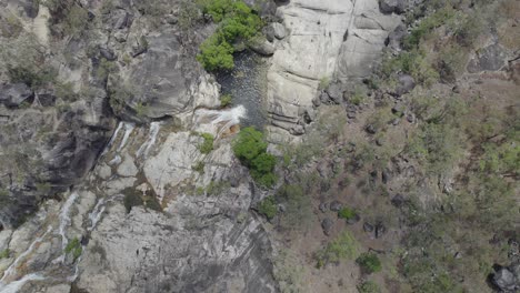 Top-Down-View-Of-Emerald-Creek-Falls-In-Mareeba,-Australia---aerial-orbit