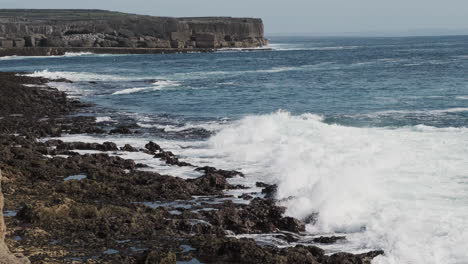 Sea-waves-crashing-on-rocky-shore-of-Inishmore-island-in-Ireland