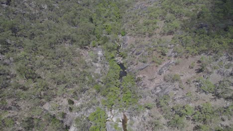 Nature-Landscape-At-Emerald-Creek-Falls-In-Mareeba,-Australia---aerial-drone-shot