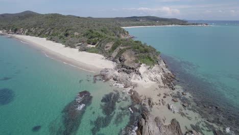 White-Sandy-Beach-Shore-At-Great-Keppel-Island-In-Queensland,-Australia---aerial-drone-shot