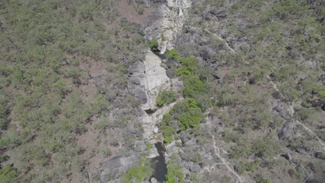 Emerald-Creek-Falls-Flowing-Through-Rainforest-And-Granite-Boulders-Near-Mareeba-In-Australia