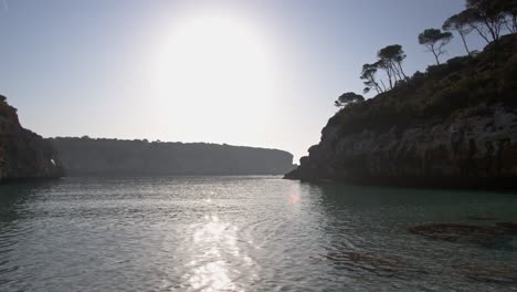 Static-wide-shot-showing-tranquil-Calo-des-Moro-during-sunny-day-at-sky-on-Mallorca