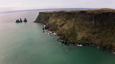 Drone-Shot-Of-Cliffs-And-The-Ocean-Moving-Left