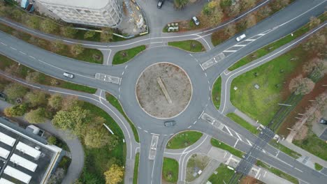 Aerial-Top-Down-View-Cars-Driving-Through-Roundabout-In-Augsburg