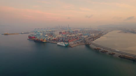 Orbit-Shot-Of-Algeciras-Spain-Shipping-Harbour-Port-Industrial-Transportation-Cargo