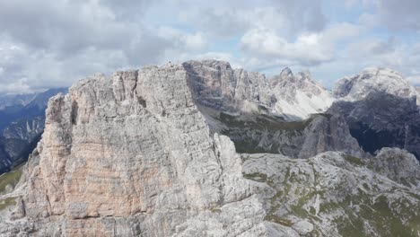 Close-up-aerial-of-tall-mountain-peak-in-Italian-Dolomites,-Torre-Di-Toblin-,-at-Tre-Cime-Di-Lavaredo