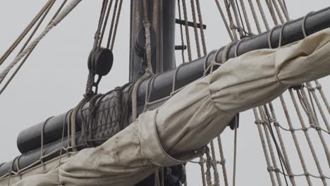 Ferdinand-Magellan-Nao-Victoria-carrack-boat-replica-mast-and-sail-tilt-detail-shot-in-slow-motion-60fps