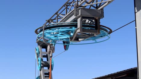 Angled-View-Of-Ski-Lift-Wheel-Pulling-Cable