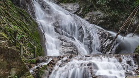 Long-exposure-waterfall-time-lapse-with-silky-water-inside-lush-jungle