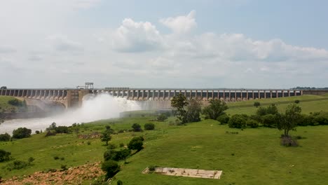 Wide-View-Drone-Shot-of-Dam-Wall-and-Floodgates-Open