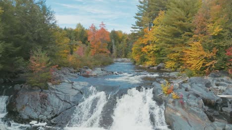 Tobey-Falls-on-Big-Wilson-Stream-flanked-by-Autumn-colored-foliage