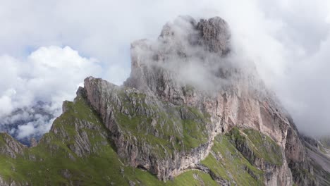 Cloudy-mountain-peak-in-Italian-Dolomites,-push-in-aerial-view