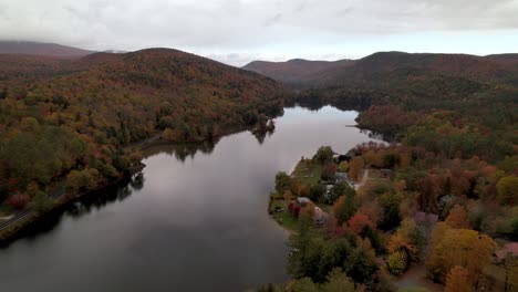 aerial-tilt-down-fall-colors-over-lake-in-fall-in-vermont