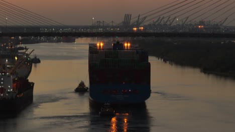 Huge-cargo-ship-approaches-bridge-in-Savannah-Georgia