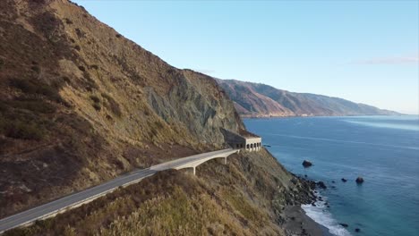 Above-Drone-shot-of-Big-Sur,-CA-Mountains,-Ocean,-and-the-Pacific-Coastal-Highway