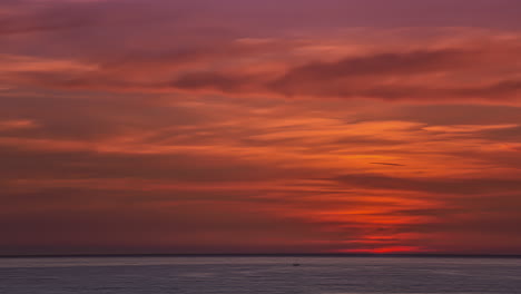 Fiery-Sky-At-Sunrise-Over-Sea.-timelapse