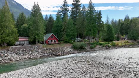 Aerial-view-of-an-AirBnB-cabin-perched-on-the-Skykomish-River