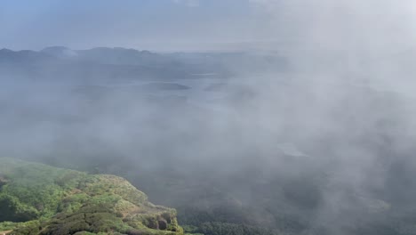 Foggy-Clouds-Enveloping-The-Mountains-In-Kalsubai-Harishchandragad-Wildlife-Sanctuary,-Western-Ghats,-Maharashtra-India