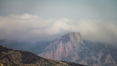Time-lapse-of-Atlas-moroccan-mountains-being-enveloped-by-a-dense-cloud-cover