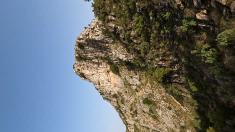 4k-Vertical-shot-of-a-lonely-mountain-cliff-at-La-Concha,-Marbella,-Spain
