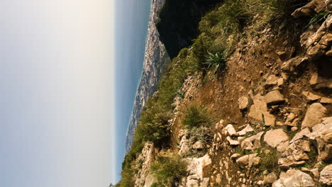 4k-Vertical-shot-of-a-rocky-path-on-a-mountain