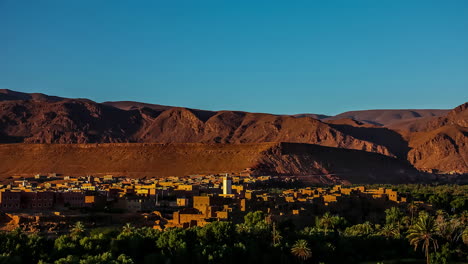 Dawn-at-a-Moroccan-village-beneath-the-sandy-Rif-Mountain-range---sunrise-time-lapse