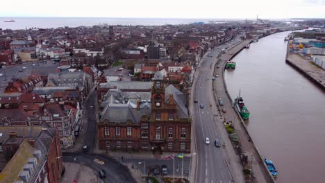 Aerial-shot-of-great-yarmouth-city-street-and-Ukraine-and-England-flag-waving-in-the-air