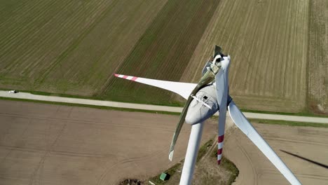 Aerial-View-Of-Wind-Turbine-With-Broken-Blade-At-Wind-Farm