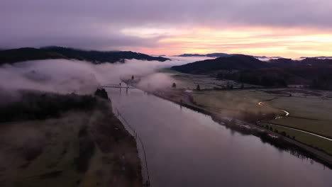 Aerial-view-of-South-Coos-River-and-bridge-at-sunrise