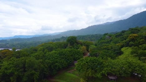 Cloudy-summer-aerial-drone-view-shot-of-tropical-forest-area