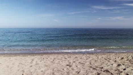 Calm-waves-at-an-empty-Mediterranean-beach