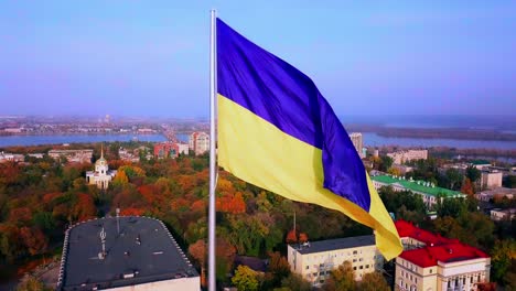 Ukrainian-flag-waving-on-tall-flagpole-representing-Ukraine-freedom