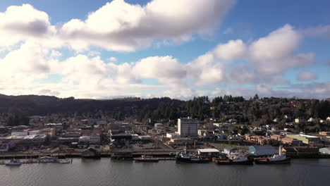 Coos-Bay,-Oregon,-USA.-Drone-pullout-over-bay