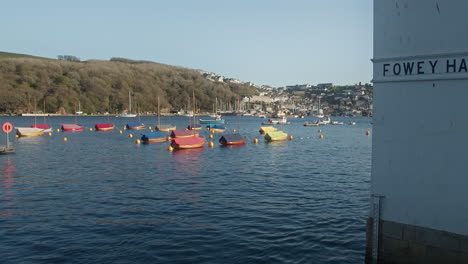Traditional-Wooden-Boats-Moored-At-Fowey-Harbour-In-England,-United-Kingdom