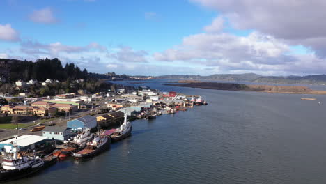 Coos-Bay-Oregon,-industrial-ships-and-boats-moored-at-marina