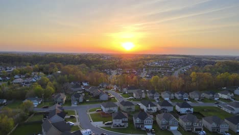 Neighborhood-reveal-during-beautiful-sunset---Aerial-footage
