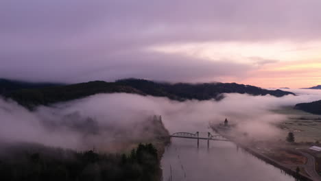 Dramatic-Oregon-sunrise-over-Coos-River-and-bridge