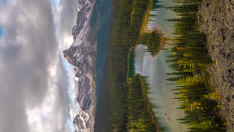 Vertical-4k-Time-Lapse-of-Pristine-Nature-of-Canada,-Clouds-Moving-Above-Picturesque-Valley-and-Snow-Capped-Hills