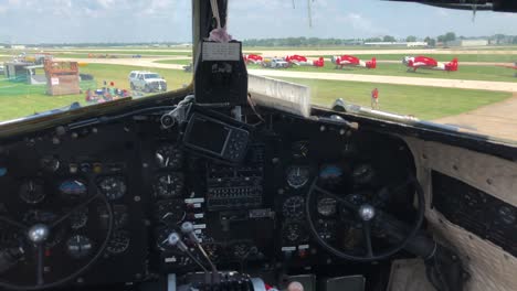 Cockpit-of-vintage-airliner-on-ground