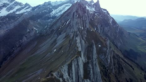 High-rocky-mountain-peak-of-Mt-Schafler,-Swiss-Prealps-in-Switzerland