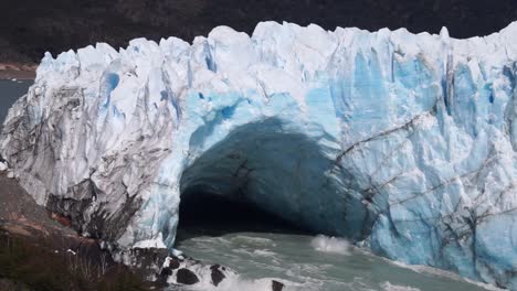 Massive-glacier-calving-with-huge-water-splash,-climate-change-concept