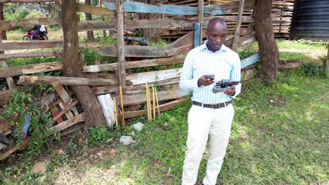 An-African-drone-pilot-flying-drone-in-rural-Africa