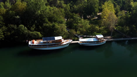 Tourists-Getting-Off-From-Boat-Docked-At-Terminal-In-Krka-National-Park,-Croatia