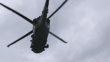 Slow-motion-footage-of-blackhawk-helicopter-flying-overhead