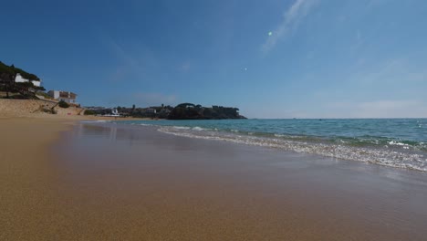 La-Fosca-beach-in-Girona-Mediterranean-sea-without-people-paradisiacal-blue-turquoise-blue-sky-slow-motion